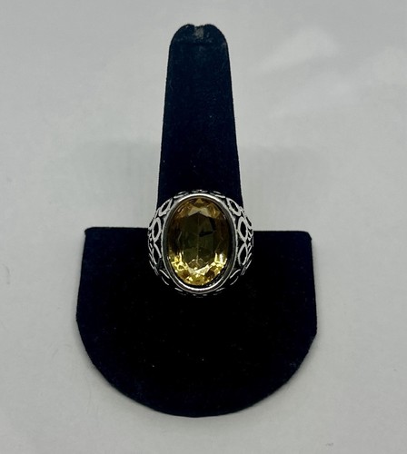 Large oval yellow faceted faux - oval,